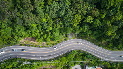 Car and road on the hill in Phuket, Thailand. Aerial view from flying drone