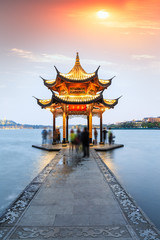 ancient pavilion of Hangzhou west lake at dusk, in China