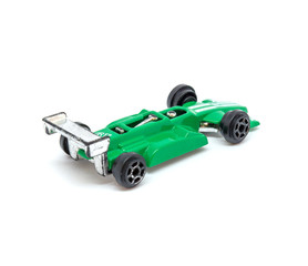 Obraz premium Photo of green toy model car isolated on white background