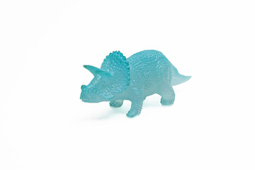 Dinosaur toy plastic figures on white background