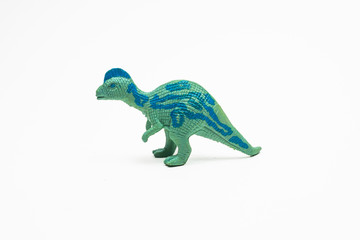 Dinosaur toy plastic figures on white background