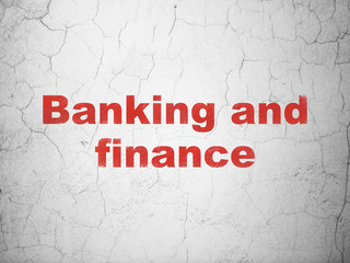 Currency concept: Banking And Finance on wall background
