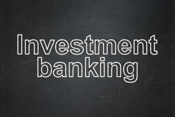 Money concept: Investment Banking on chalkboard background