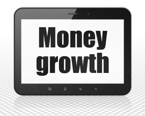 Money concept: Tablet Pc Computer with Money Growth on display