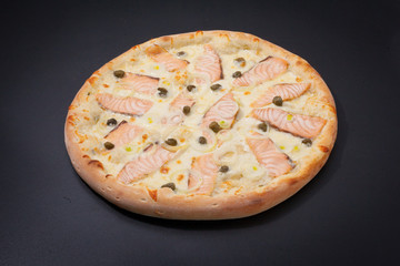 Pizza with Mozzarella, Salmon Slice, Black Olives and Vegetables