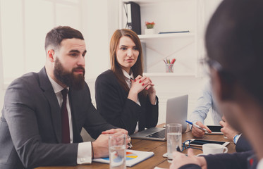 Business meeting. Young businesswoman in modern office