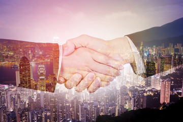 shaking hand between businessman and businesswoman isolated on white