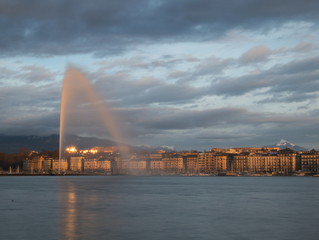 Geneva skyline with jet d’eau fountain on the lake in Geneva, Switzerland.