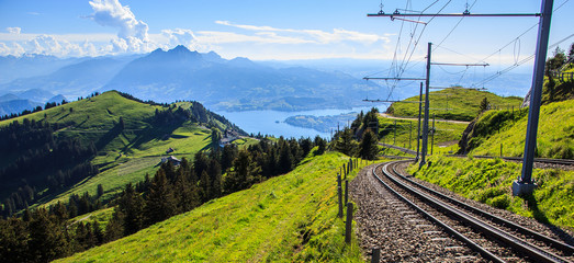 cogwheel train window view of railway track down Rigi Kulm Station, Lucerne, Switzerland.