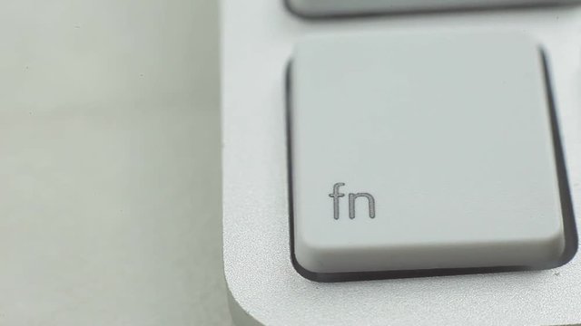 Macro video of function button on laptop keyboard