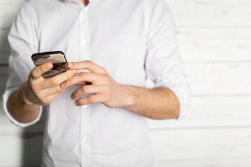 Man Reading Something on the Screen of His Cell Phone