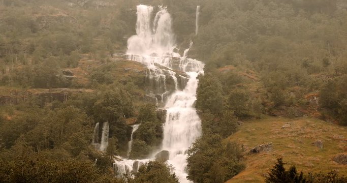 Waterfall In Briksdalsbreen Valley In Heavy Rain, Norway - Cinematic Style