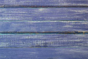 Wooden surface of purple color, texture or background