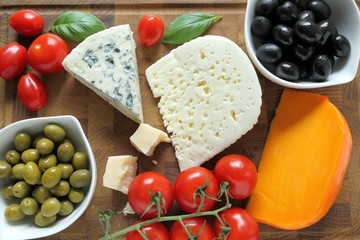 Cheeses and olives.