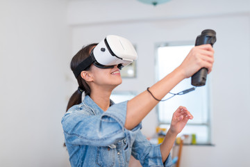 Woman playing game with virtual reality © leungchopan