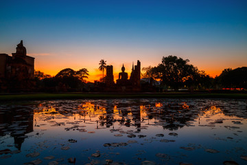 Fototapeta na wymiar Wat Mahathat Temple at Sukhothai Historical Park, a UNESCO world heritage site in Thailand