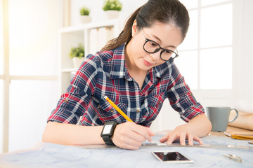 Young architect wearing smart wrist watch
