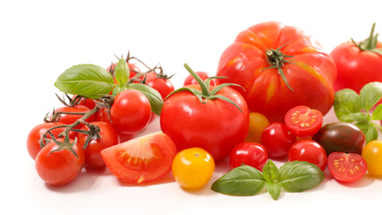 assorted colorful tomatoes on white background