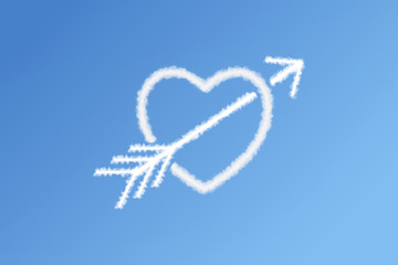 Heart of clouds with arrow