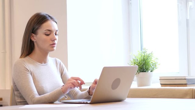 Female Designer Typing on Laptop, Keyboard