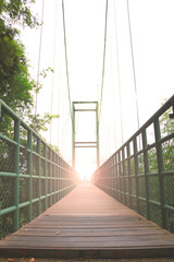 Obraz premium Rope bridge wood floor, Sweetheart on the steel bridge with blurred style