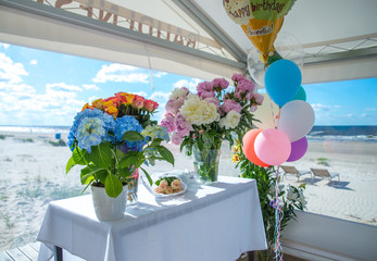Elegant basket of Peony-rose flowers and roses. Flower arrangement.