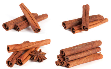three cinnamon sticks with star anise isolated on white background. Collection or set