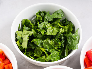 Diet detox concept. Eat cook spinach. Magnesium font