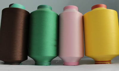 color elastic thread in the production of knitwear