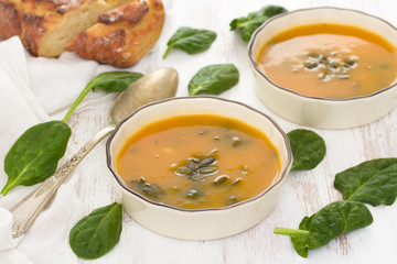 pumpkin vegetable soup with spinach and corn bread