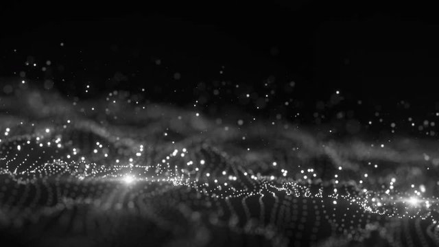 Field of glowing particles on black. Computer generated seamless loop abstract motion background. Animation render with depth of field 4k (4096x2304)
