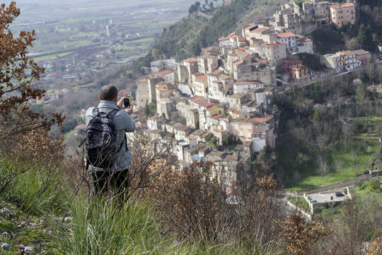 hiker on mountain trail at pietravairano village