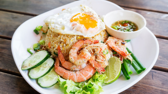 Fried rice with shrimp and fried egg, Thai food.