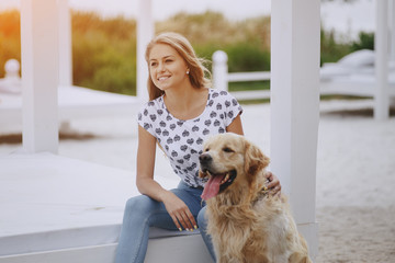 couple walking outdoors with her dog