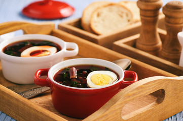 Homemade cold beetroot soup with egg.