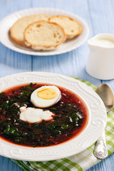 Homemade cold beetroot soup with egg.
