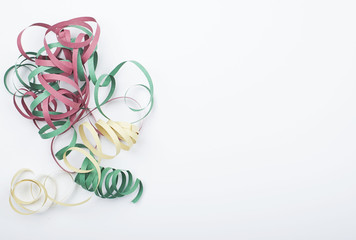 Colorful ribbons of a party on white background. Celebration.