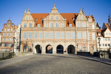 Fototapeta na wymiar Green Gate - formal residence of the Polish monarchs, located at the eastern end of the Royal Route at sunrise, Gdansk, Poland