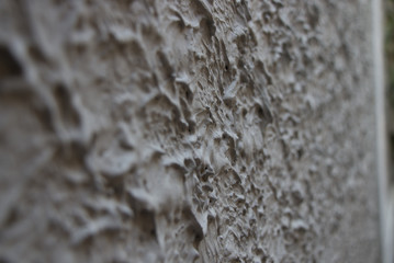 a grey cement wall close up