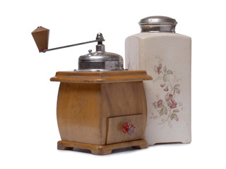 Ancient wooden coffee grinder on a white background