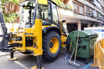 Images of works with backhoe