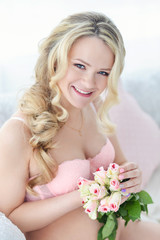 woman with bouquet of white roses