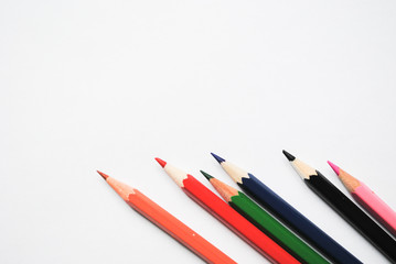 Colored pencils and a piece of paper