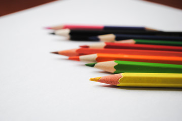 Colored pencils and a piece of paper