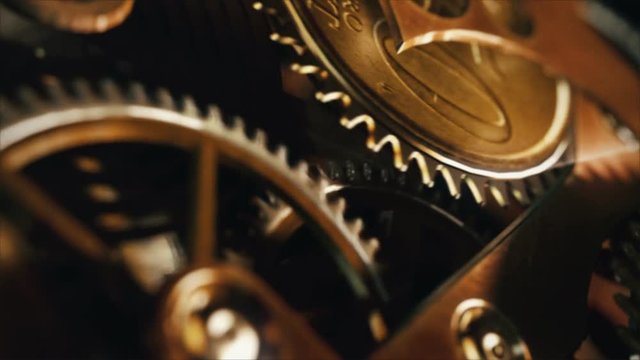 Clock with coins in place of gears. Time is money.  A nice business background for any videos or presentations related money, funds, banking or economy. 