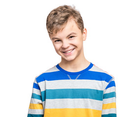Close up emotional portrait of caucasian teen boy. Head shot of handsome guy. Funny cut teenager, isolated on white background. Child looking at camera.