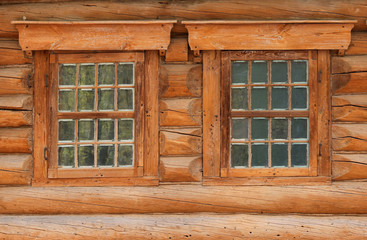 Detail of an old house with unusualy wooden windows