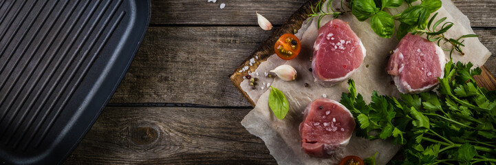 Raw filet mignon meat cuts with spice and herbs