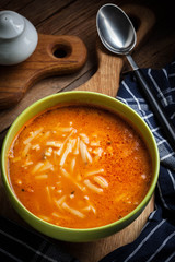 Homemade tomato soup with noodles.