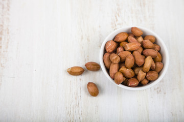 Peanuts in a white bowl